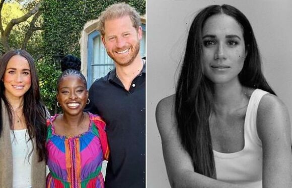 Meghan Markle and Prince Harry pose with American poet Amanda Gorman