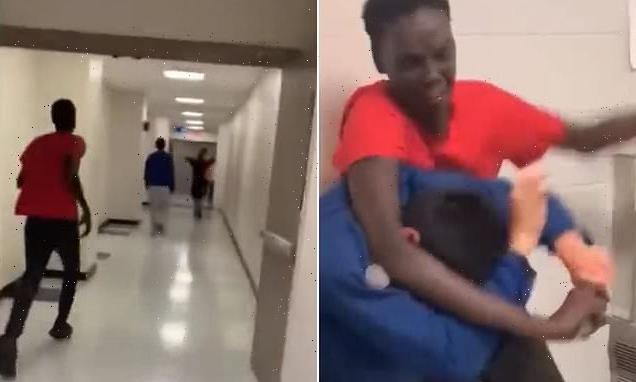 Moment hero teacher disarms student, 17, who stabbed a classmate