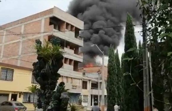 Plane crashes into city apartment building sparking fireball blaze with at least eight feared dead in Colombia | The Sun