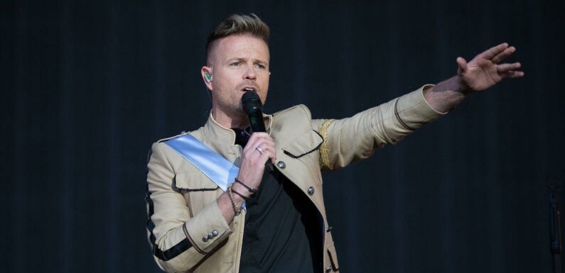 Westlife singer Nicky Byrne says hes battered and bruised after falling off stage