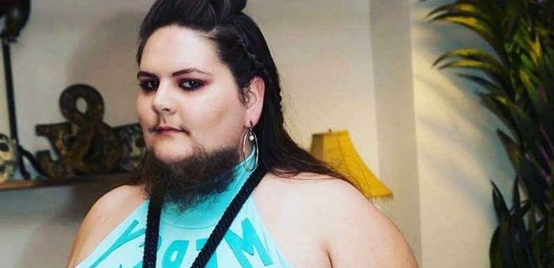Woman who shaved twice a day after growing beard at 13 now embracing facial hair