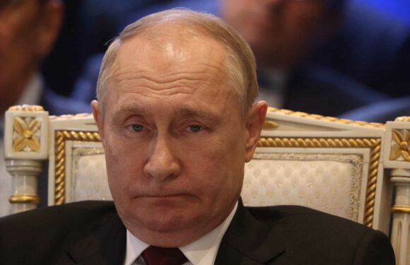 ‘Critically ill’ Putin’s hand turns PURPLE as he’s seen clutching chair during meeting with Cuban President | The Sun