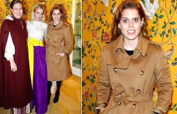 A festive night out! Princess Beatrice looks elegant in a trench coat