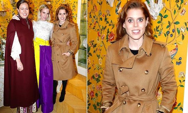 A festive night out! Princess Beatrice looks elegant in a trench coat