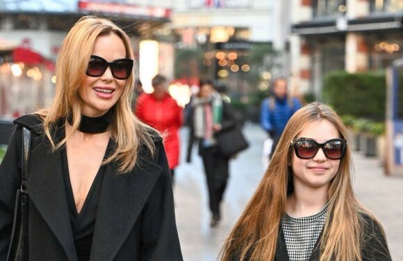 Amanda Holden is twinning with daughter Hollie, 10, as they wear matching coats and sunglasses