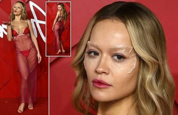 British Fashion Awards: Rita Ora wows in sheer gown and webbed make-up