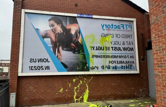 Gym advert sparks so much outrage it even has paint thrown over it | The Sun