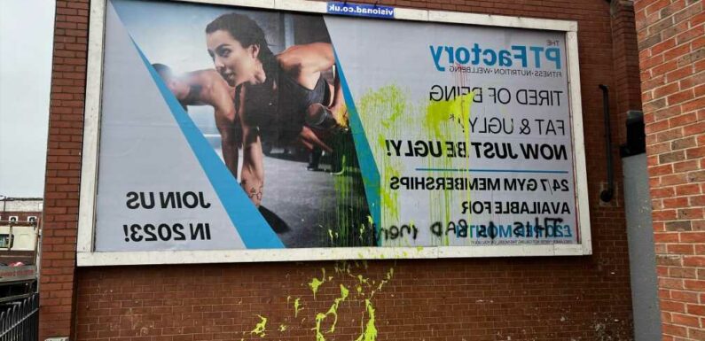 Gym advert sparks so much outrage it even has paint thrown over it | The Sun