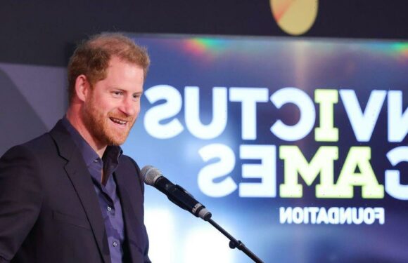 Harry ‘in tears’ in new photo as ‘visibly moved’ Prince embraces Army veteran