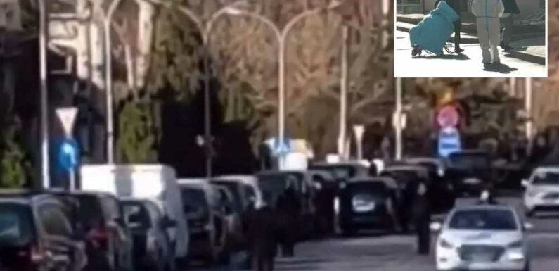 Horror vid shows snaking 20 DAY-long line of hearses at crematorium as ‘thermonuclear’ Covid outbreak ravages China | The Sun