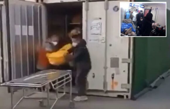 How China is being overwhelmed by Covid ‘mega-tsunami’ as dead pile-up in containers & sick die in corridors | The Sun