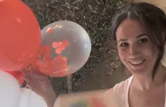 Inside Archie’s first birthday as Harry and Meghan are seen making a balloon arch and cake