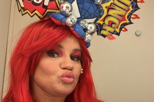 Kerry Katona looks almost unrecognisable as she glams up in a red wig as Superwoman | The Sun