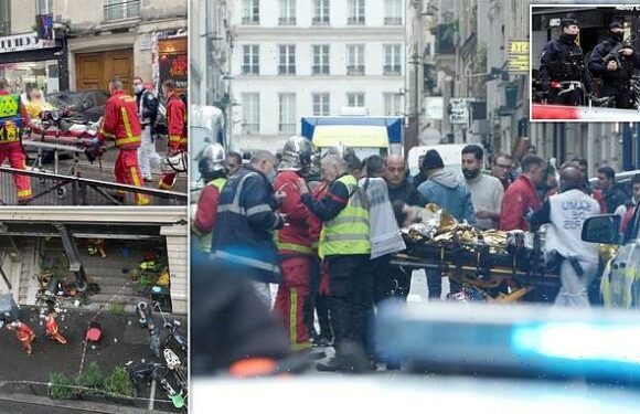 Kurds clash with police after 'racist far-right' gunman kills three