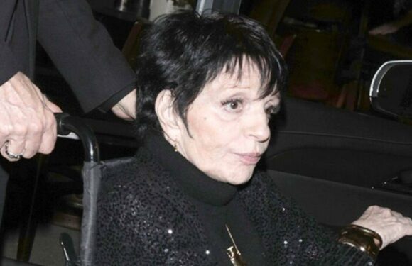 Liza Minnelli aided by wheelchair as she struggles to keep her balance