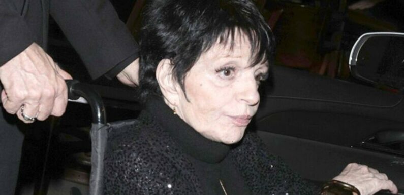 Liza Minnelli aided by wheelchair as she struggles to keep her balance