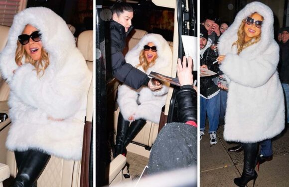 Mariah Carey goes for Queen of Christmas look in large white fur coat