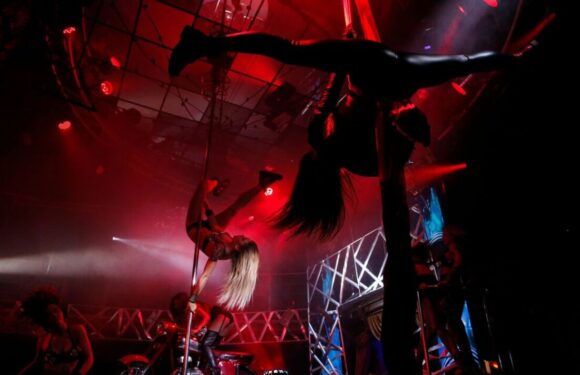 Putin consoles himself at strip club as popularity plunges