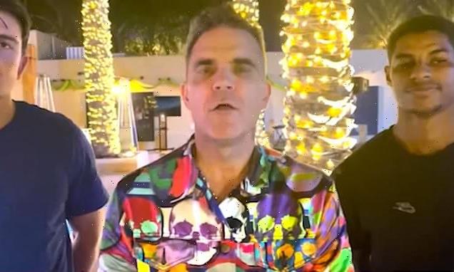 Robbie Williams duetted with England stars as he performed private gig