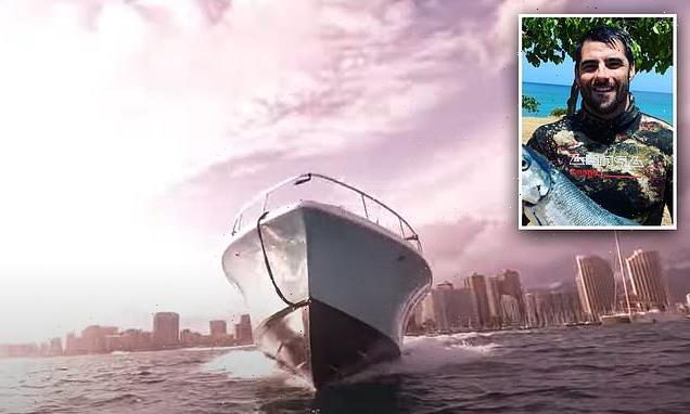 Spearfishing diver narrowly avoids being run over by speeding boat