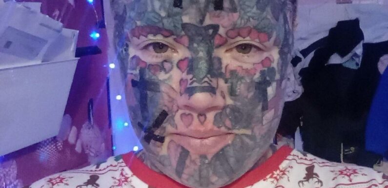 Tattoo addict forced to watch childs nativity from window due to extreme look