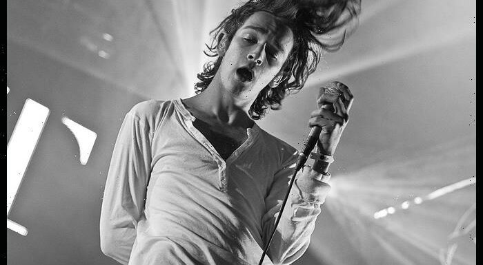 The 1975s Matty Healy Gets Tattoo On Stage