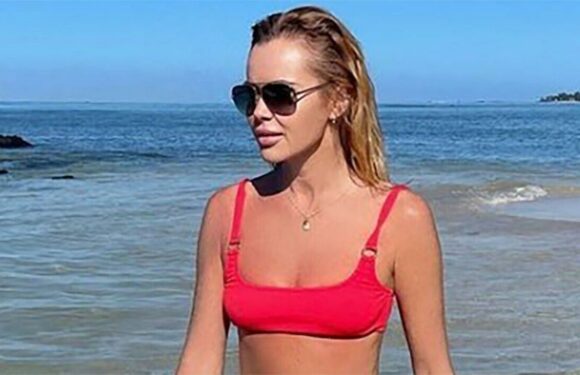 Amanda Holden looks ageless in red bikini as break with husband ends