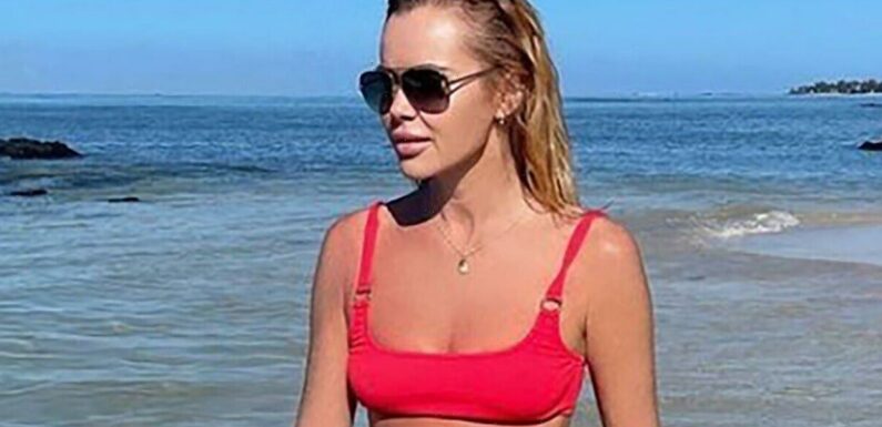 Amanda Holden looks ageless in red bikini as break with husband ends
