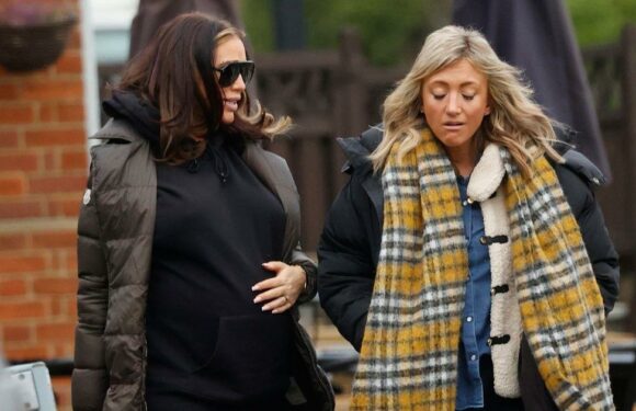 Amy Childs cradles baby bump as she enjoys lunch date with pal ahead of welcoming twins