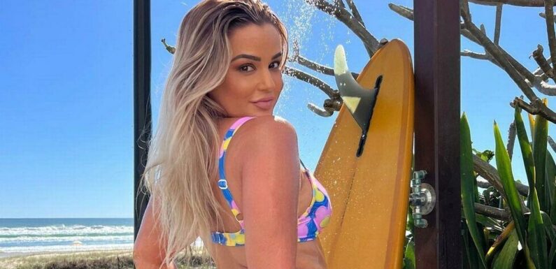 Bikini model proudly flashes booty as she tells her haters to be better