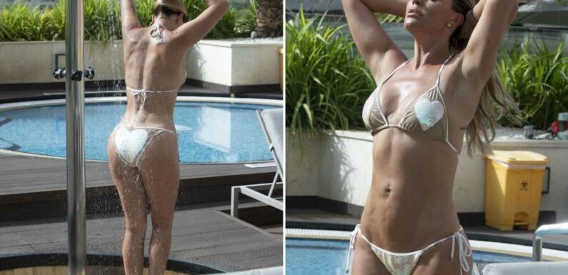 Danielle Lloyd shows off her figure as she showers in a bikini on luxury Dubai holiday | The Sun