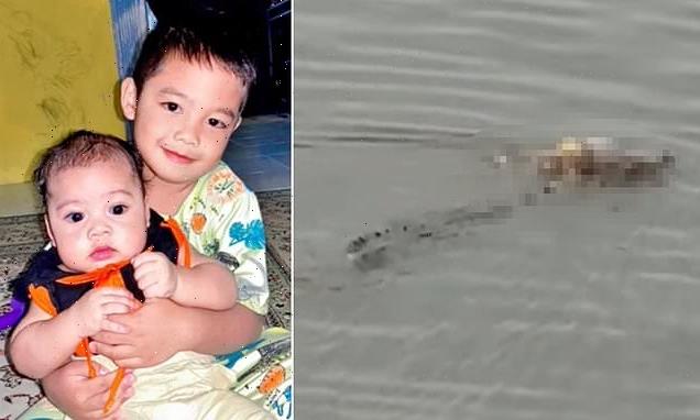 Extraordinary moment crocodile carries body of a boy, 4, down a river