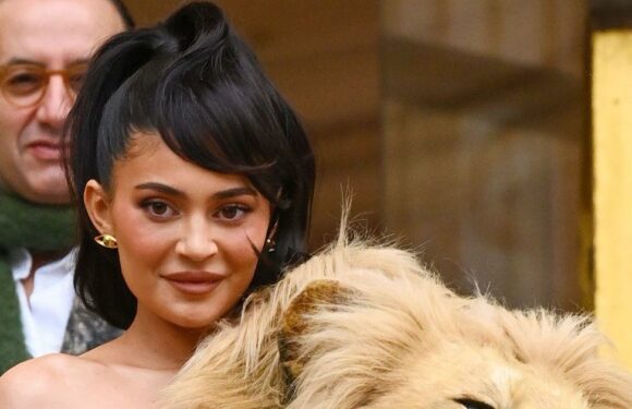 Kylie Jenner slammed by fans who are left feeling sick as she wears lion head to fashion show