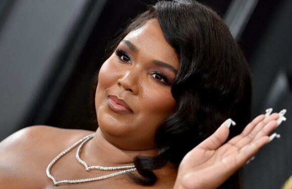 Lizzo Vacations in a Tiny String Bikini and Moon Boots