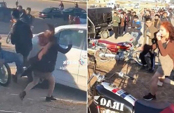 Moment men attack girl, 17, for 'dressing immodestly' in Iraq
