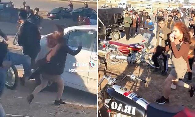 Moment men attack girl, 17, for 'dressing immodestly' in Iraq