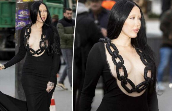 Noah Cyrus covers her breasts with couture chain at Paris Fashion Week