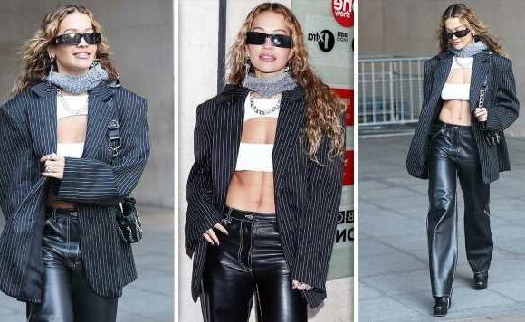 Rita Ora flashes rock hard abs in risque top during BBC appearance