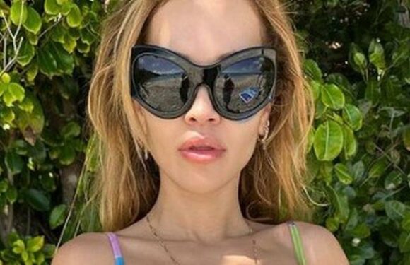 Rita Ora labelled ‘perfect’ as she flaunts toned abs in tiny bikini on beach