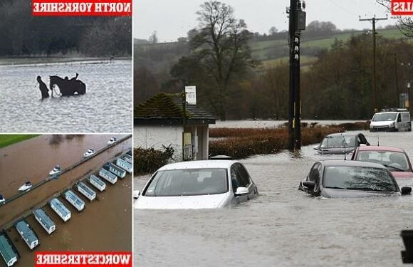 Rivers burst banks as floods put homes at risk & keep drivers indoors