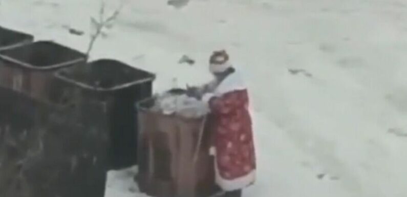 Russian Santa spotted rifling through bins