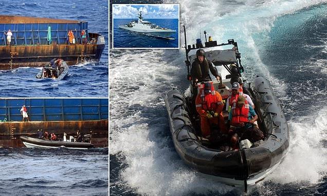 Sailors on Royal Navy warship rescue five in choppy Caribbean seas