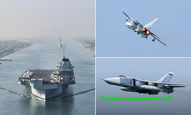 Squad of lethal Russian fighter bombers roar past HMS Queen Elizabeth