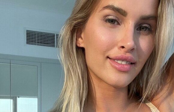 Tattoo model goes completely naked in bath to flaunt jaw-dropping ink