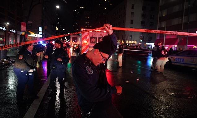 Two NYPD officers are stabbed during celebrations at Times Square