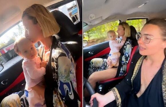 Viewers shocked as driver films baby balancing on her passenger's lap