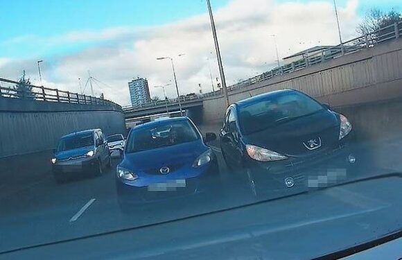 Watch as reckless driver rams into A41 central reservation