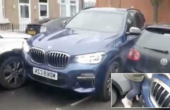 Watch as thugs in 'stolen BMW' crush woman's legs with bumper