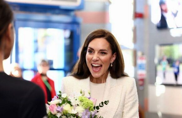 Beaming Kate Middleton is a modern Princess as she rocks trainers on school visit