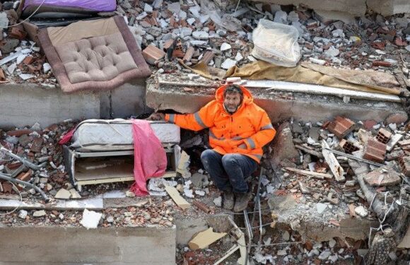 Father holds lifeless hand of daughter trapped under rubble in Turkey after quake